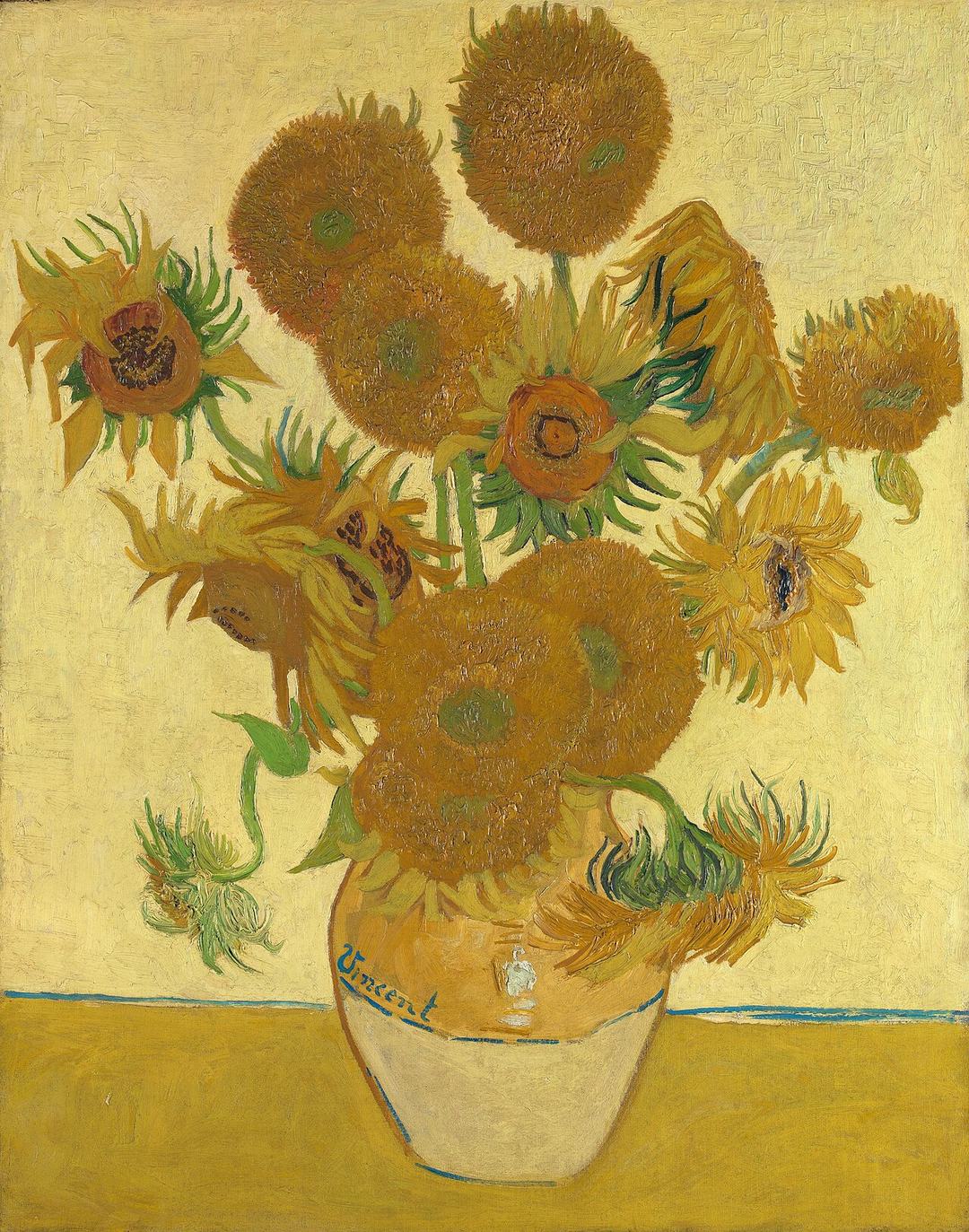Van Gogh's Sunflowers: a vase of sunflowers in which some heads are the ordinary kind, a dark seed disk ringed by petals, while others are entirely shaggy globes of petals with almost no disk — the double-flowered form